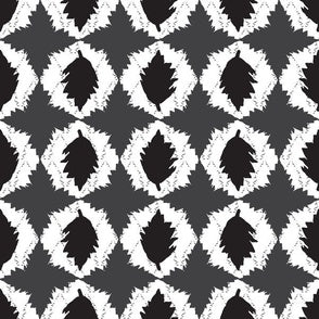 Black and white geometric pattern on a textured background