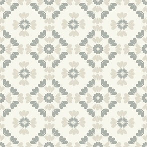 Pattern of small flowers in gray and beige on a light background