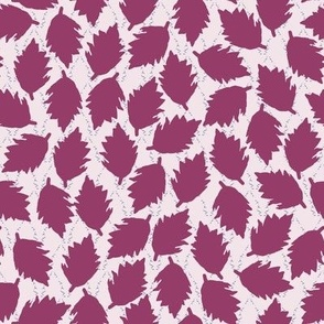Pattern of purple leaves on a white background