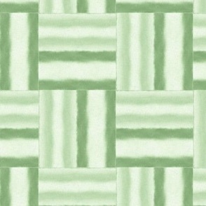 Pattern of green and white watercolor basketweave squares by Erica MacDonald.