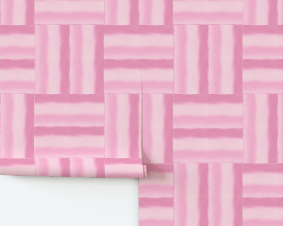 Pink geometric patterned wallpaper on a white background