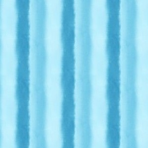 Close-up of ocean blue fabric with vertical stripes by Erica MacDonald.