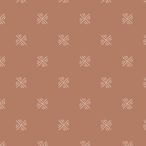 Pattern of geometric shapes on a brown background