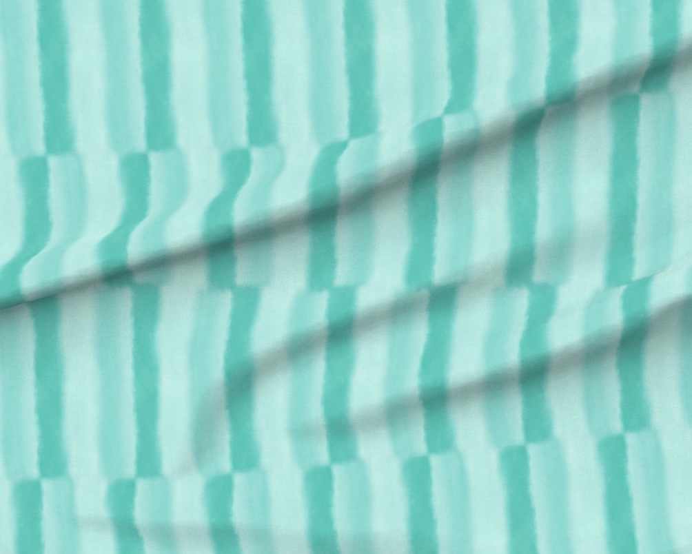 Close-up of a fabric with green and white striped pattern