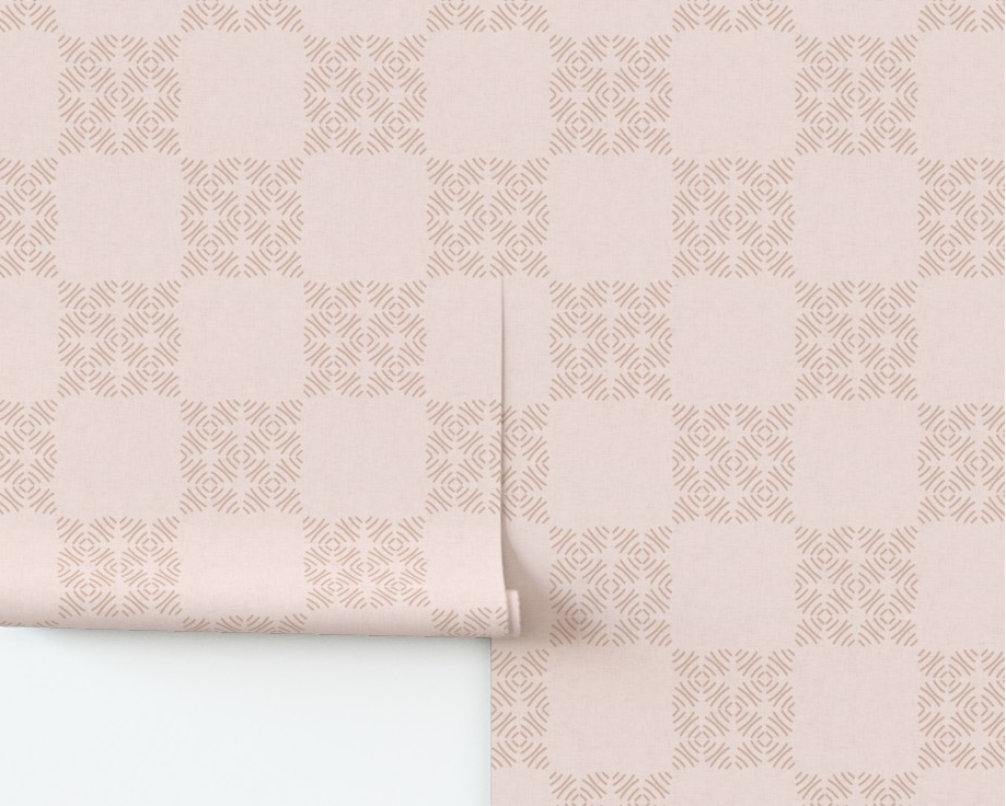 Patterned wallpaper roll on a white background