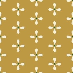 White floral pattern on a mustard yellow background
