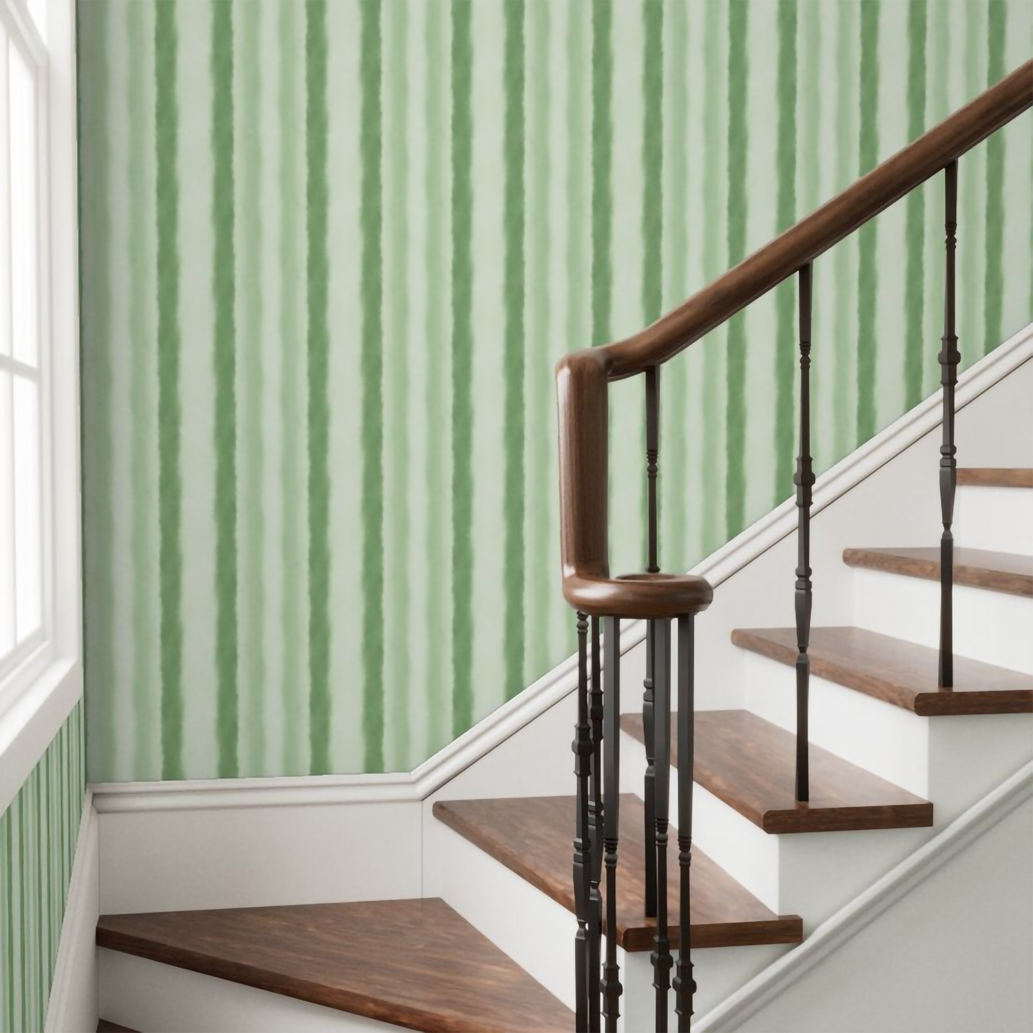Staircase with wooden steps and handrail against a green and white striped wall.